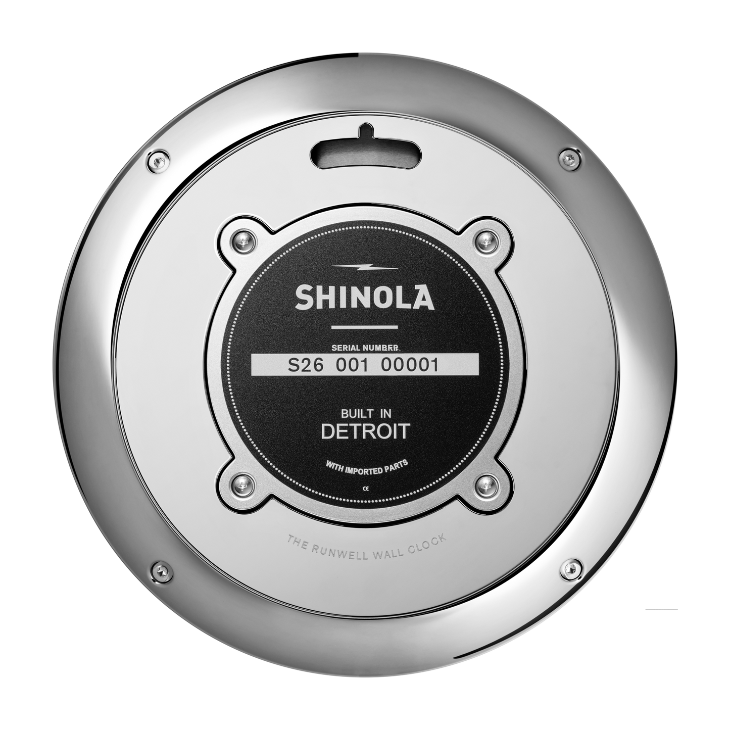 A close-up of the back of a Shinola 14" Runwell Clock - White, highlighting its serial number plate with text: "SHINOLA, Serial Number S26 001 00001, Built in Detroit, With Imported Parts.