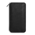 The Shinola Organizer Wallet - Black is a rectangular, natural grain leather zippered wallet with rounded edges and a textured finish, displayed closed against a white background.