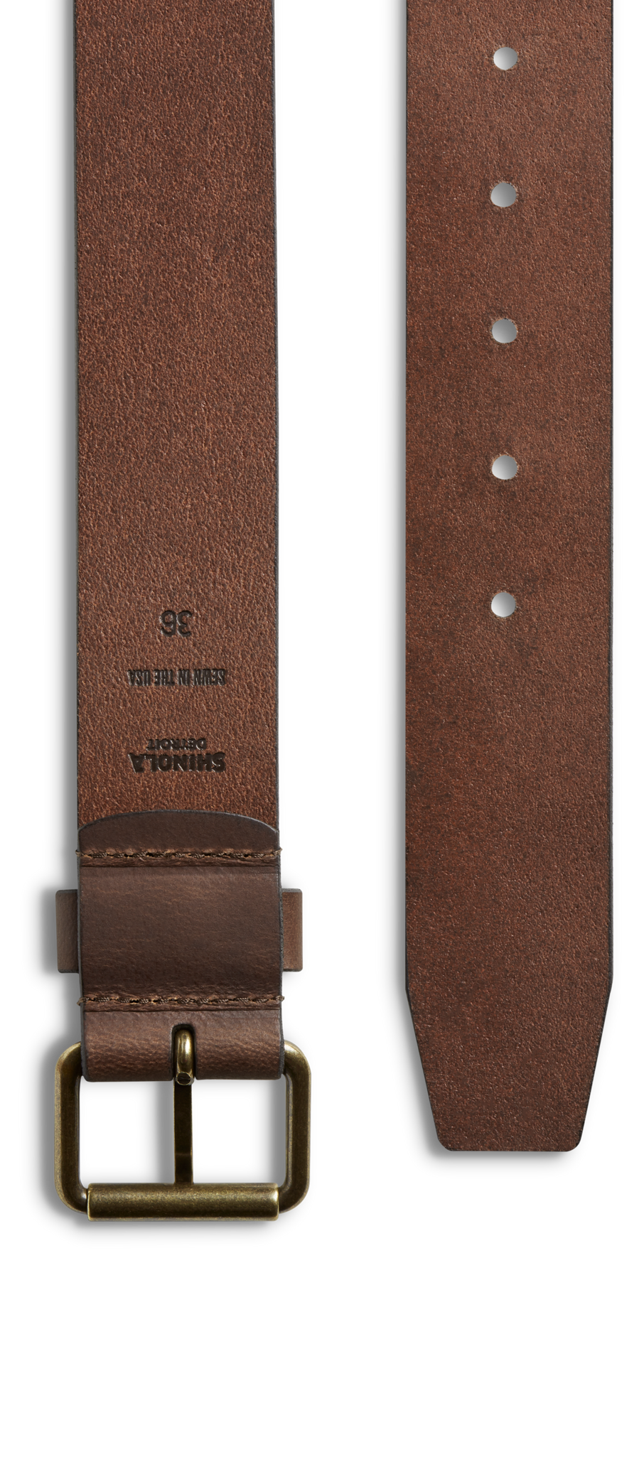 The Shinola 1 1/2" Rambler Belt in dark brown bridle leather features a brass buckle, a tapered end with holes, and size markings near the buckle for easy fitting. This smooth, handcrafted belt is a timeless accessory.