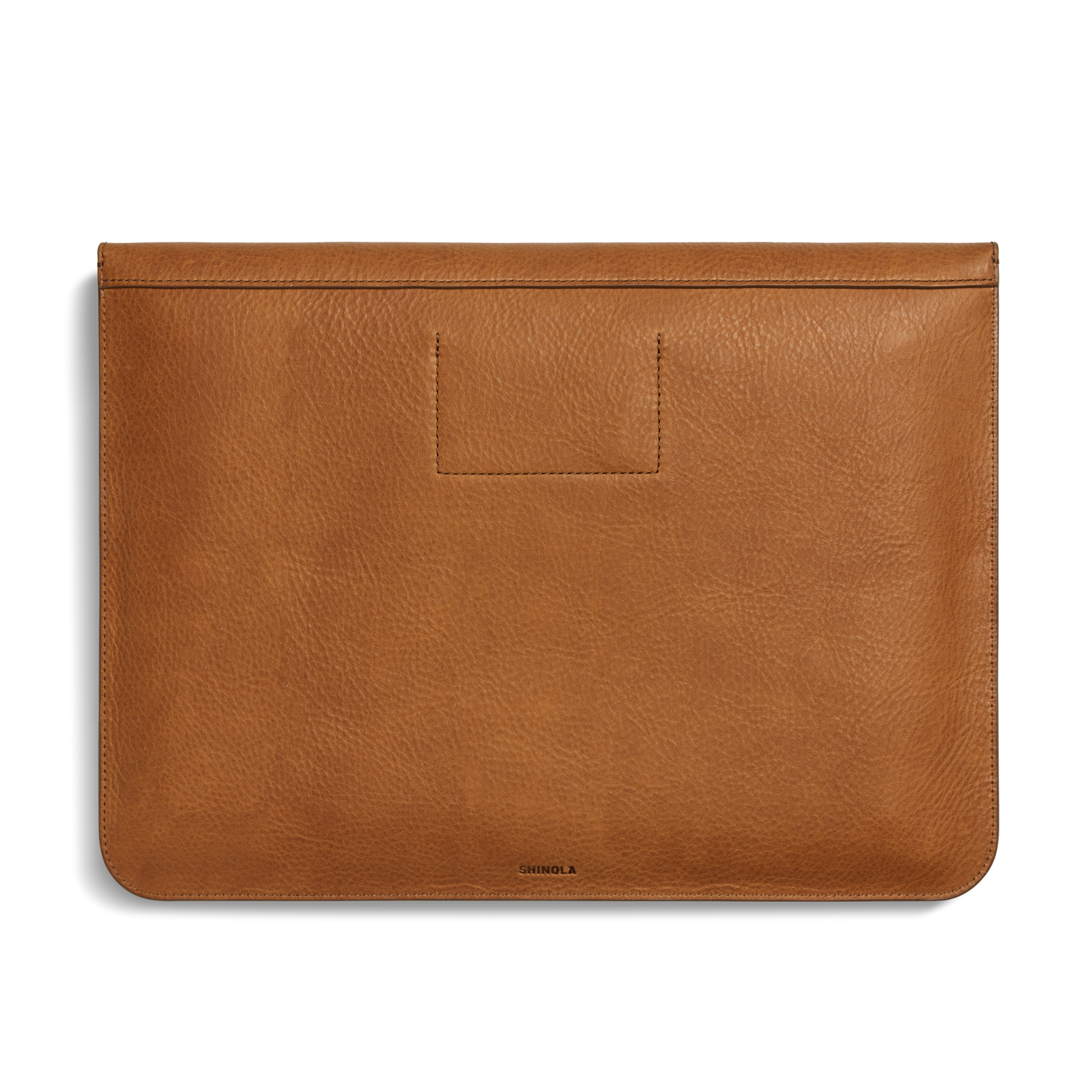 The Shinola Laptop Sleeve - Tan features Natural Grain leather with a smooth finish, minimal stitching, a front leather card pocket, and the Shinola logo printed at the bottom center.