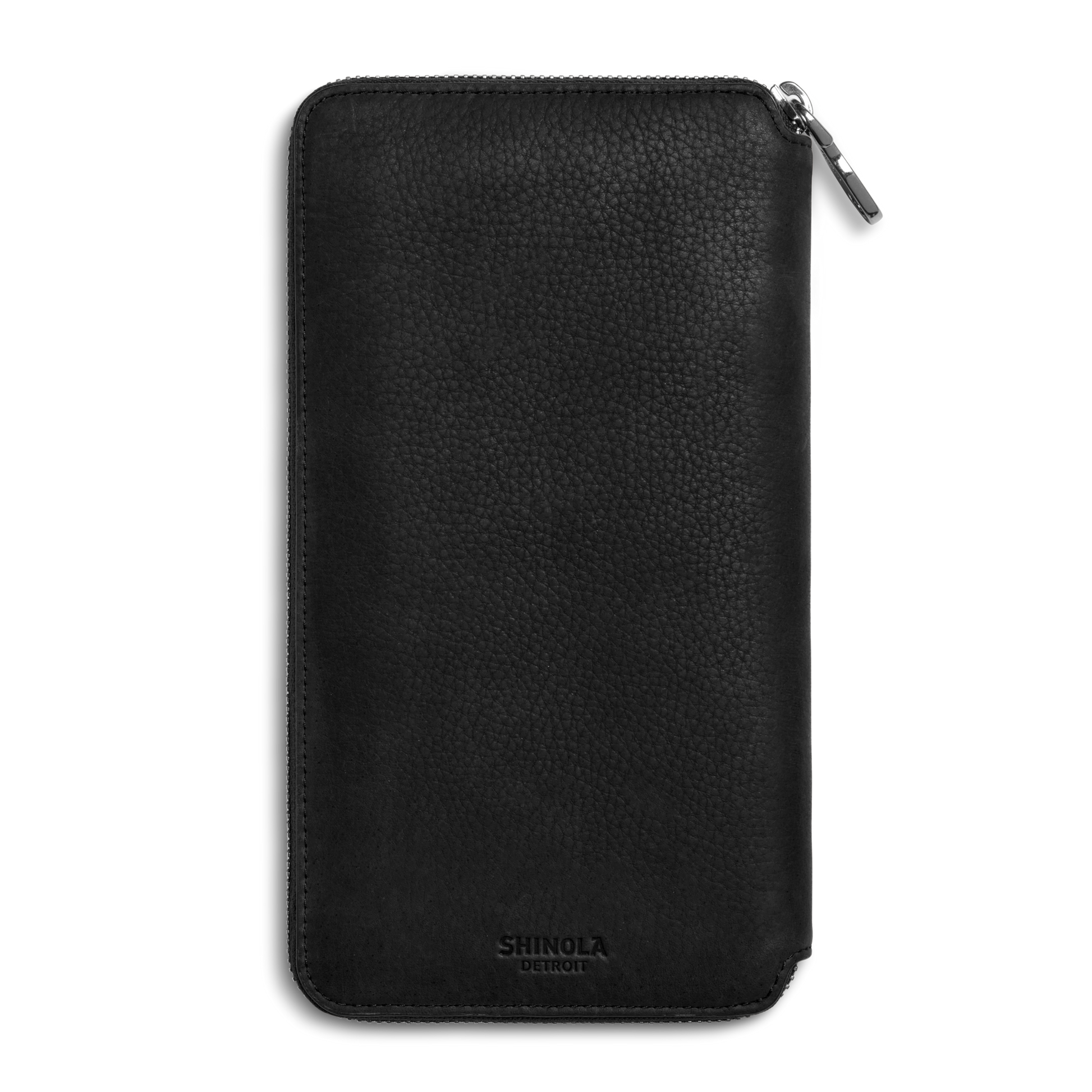 The Shinola Organizer Wallet - Black features pebbled, natural grain leather and an embossed Shinola Detroit logo near the bottom. Shown zipped closed on a white background.