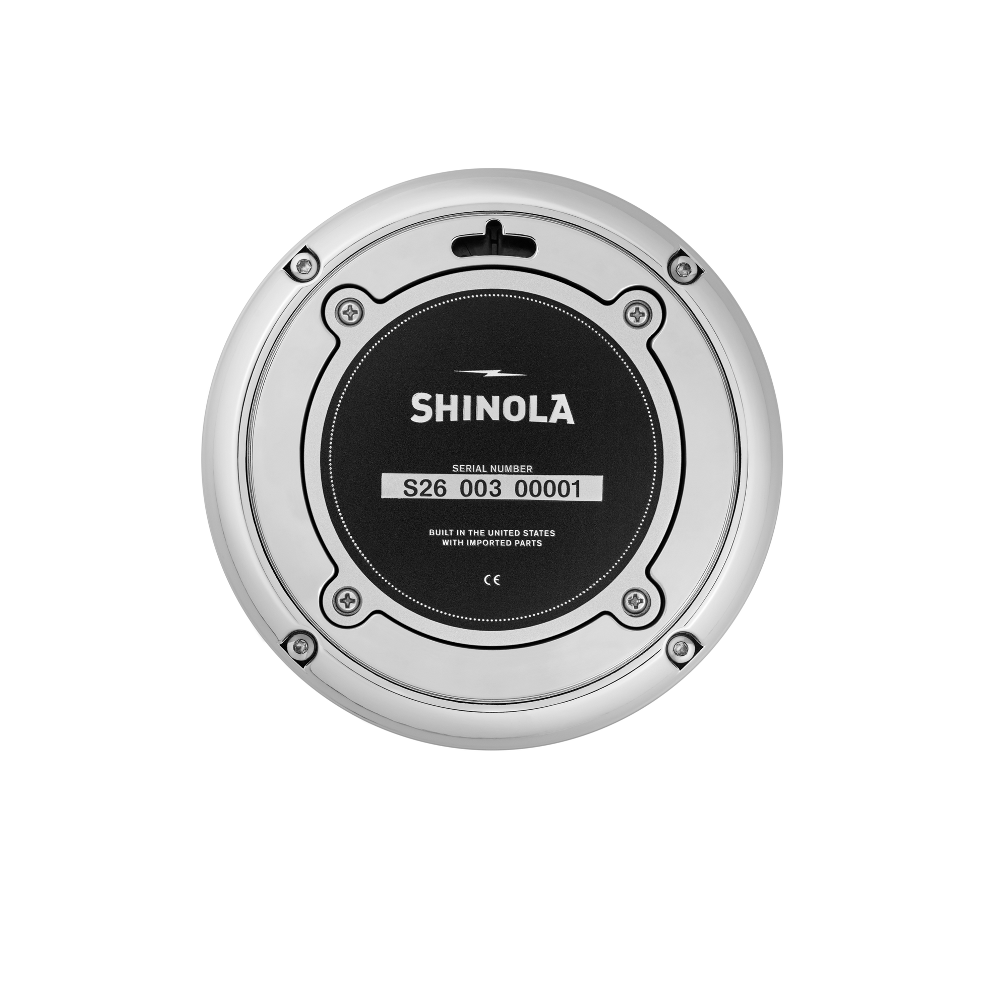 A round, green Shinola 6" Runwell Clock with silver and black accents, visible screws, serial number S26 003 00001, and "Built in the United States with imported parts" printed on a white background.